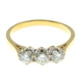 A brilliant-cut diamond three-stone ring.Estimated total diamond weight 1ct,