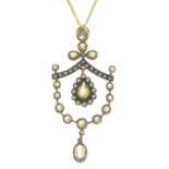 A citrine and diamond pendant,