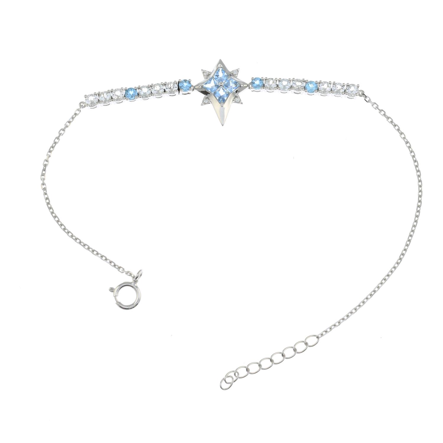 A blue topaz and gem-set bracelet.Stamped G14K. - Image 3 of 3