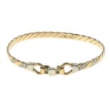 A 9ct gold bangle,