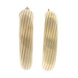 A pair of 9ct gold hoop earrings, with grooved detail.Import marks for 9ct gold.