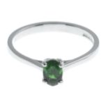 An 18ct gold green tourmaline single-stone ring.Green tourmaline weight 0.44ct.