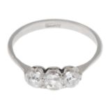 An old-cut diamond three-stone ring.Estimated total diamond weight 0.55ct,