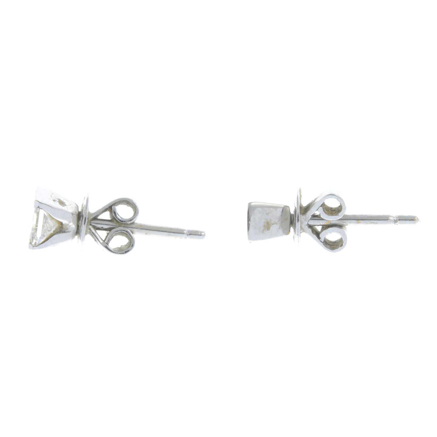A pair of rectangular-shape diamond stud earrings.Estimated total diamond weight 0.40ct, - Image 2 of 2
