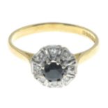An 18ct gold sapphire and diamond cluster ring.Estimated total diamond weight 0.10ct.