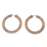 A pair of 9ct gold hoop earrings.Import marks for 9ct gold.