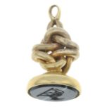 An early 20th century gold onyx intaglio fob.Length 2.3cms.