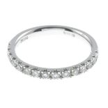 A platinum diamond half eternity ring.Total diamond weight 0.35ct.