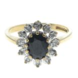 A 9ct gold sapphire and diamond cluster ring.Hallmarks for 9ct gold.