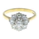 A diamond cluster ring.Estimated total diamond weight 0.85ct,