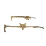 Early 20th century fox mask and riding crop bar brooch, with ruby eye detail.