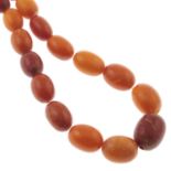 An amber single-strand necklace.
