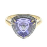 An 18ct gold tanzanite and diamond dress ring.Estimated total diamond weight 0.20ct.