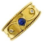 An 18ct gold sapphire and diamond band ring.