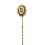 A late 19th century 15ct gold diamond stickpin.Stamped 15ct.