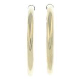 A pair of 9ct gold hoop earrings.Hallmarks for Birmingham.Length 3.3cms.