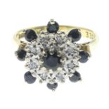 An 18ct gold sapphire and diamond dress ring.Hallmarks for 18ct gold.