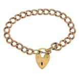 A curb-link bracelet, with padlock clasp.Stamped 9ct.
