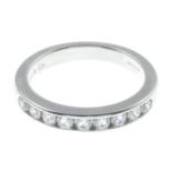 A platinum diamond half eternity ring, by Tiffany & Co.Signed Tiffany & Co.