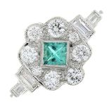 An emerald and vari-cut diamond dress ring.