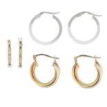 Three pairs of hoop earrings.