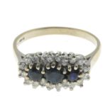 An 18ct gold sapphire and diamond triple cluster ring.Estimated total diamond weight