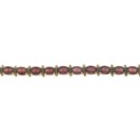 A 9ct gold garnet bracelet.Hallmarks for 9ct gold.