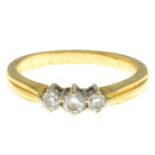 An 18ct gold brilliant-cut diamond three-stone ring.Total diamond weight 0.25ct,