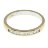 An 18ct gold baguette-cut diamond half eternity ring.Total diamond weight 0.15ct,
