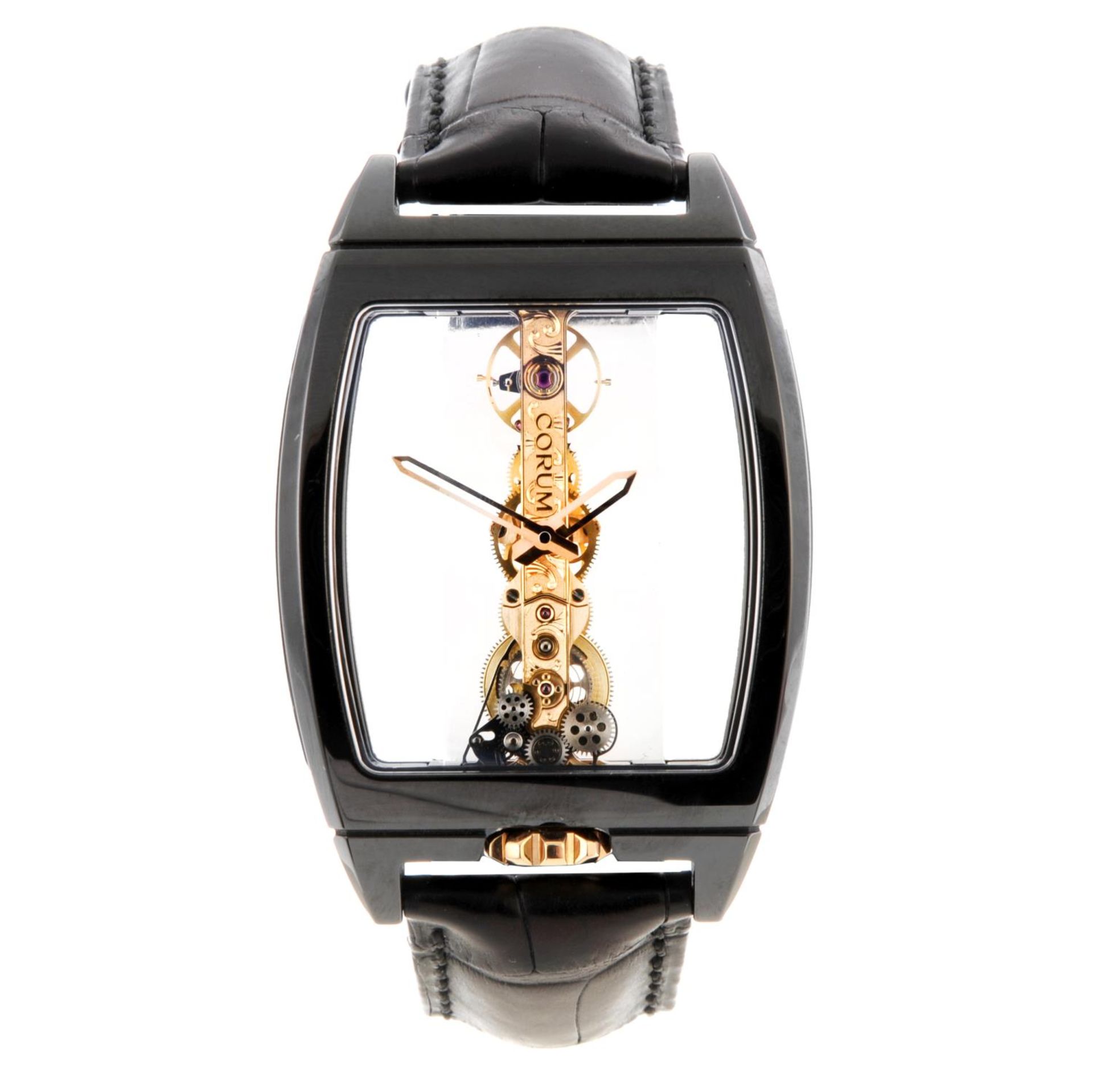 CORUM - a gentleman's Golden Bridge wrist watch.