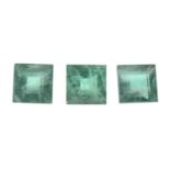 Four square-shape emeralds.