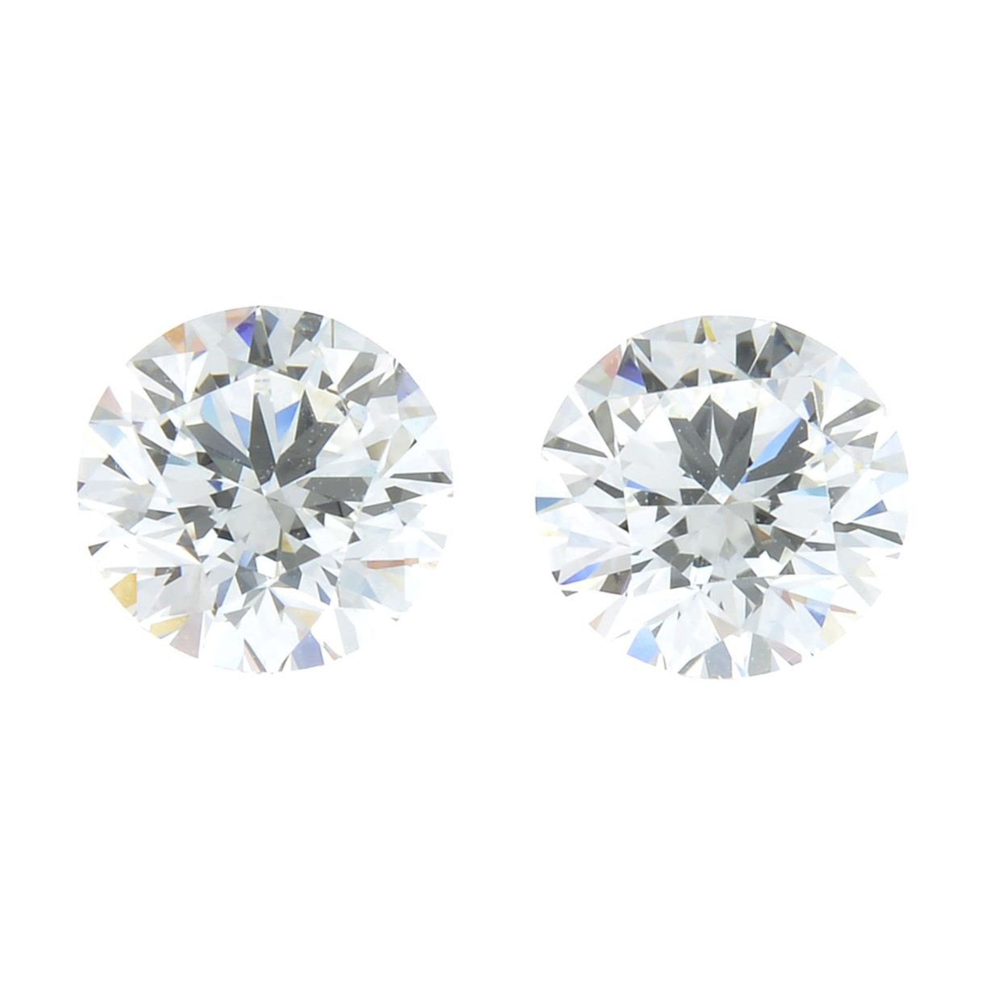 Two brilliant-cut diamonds.