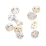 A small selection of round brilliant-cut diamonds and 'yellow' diamonds.