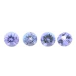 Four circular-shape tanzanites.