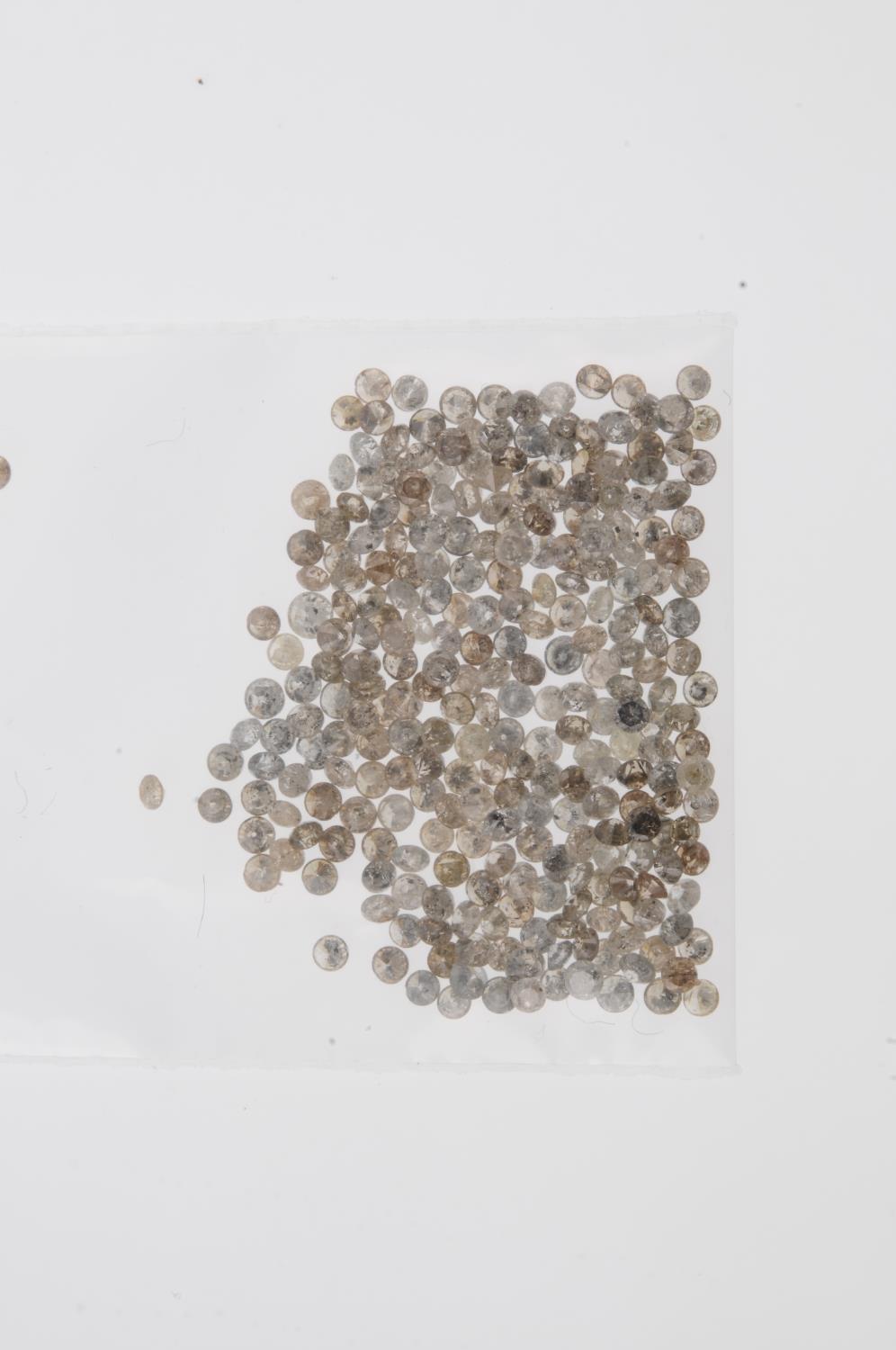 A small selection of round brilliant-cut diamonds and 'brown' melee diamonds. - Image 2 of 2