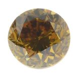 A brilliant-cut natural Fancy vivid Orange Yellow diamond.