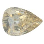 A pear-shape natural Fancy Light Brown-Yellow diamond.