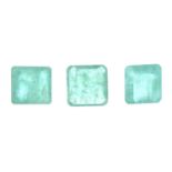 Seven rectangular-shape emeralds.