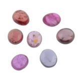 A small selection of vari-colour, vari-shape spinel cabochons.