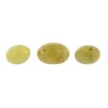 Seventeen oval cat's-eye chrysoberyl cabochons.