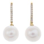 Two pairs of cultured pearl and diamond earrings.Estimated total diamond weight 0.10ct.