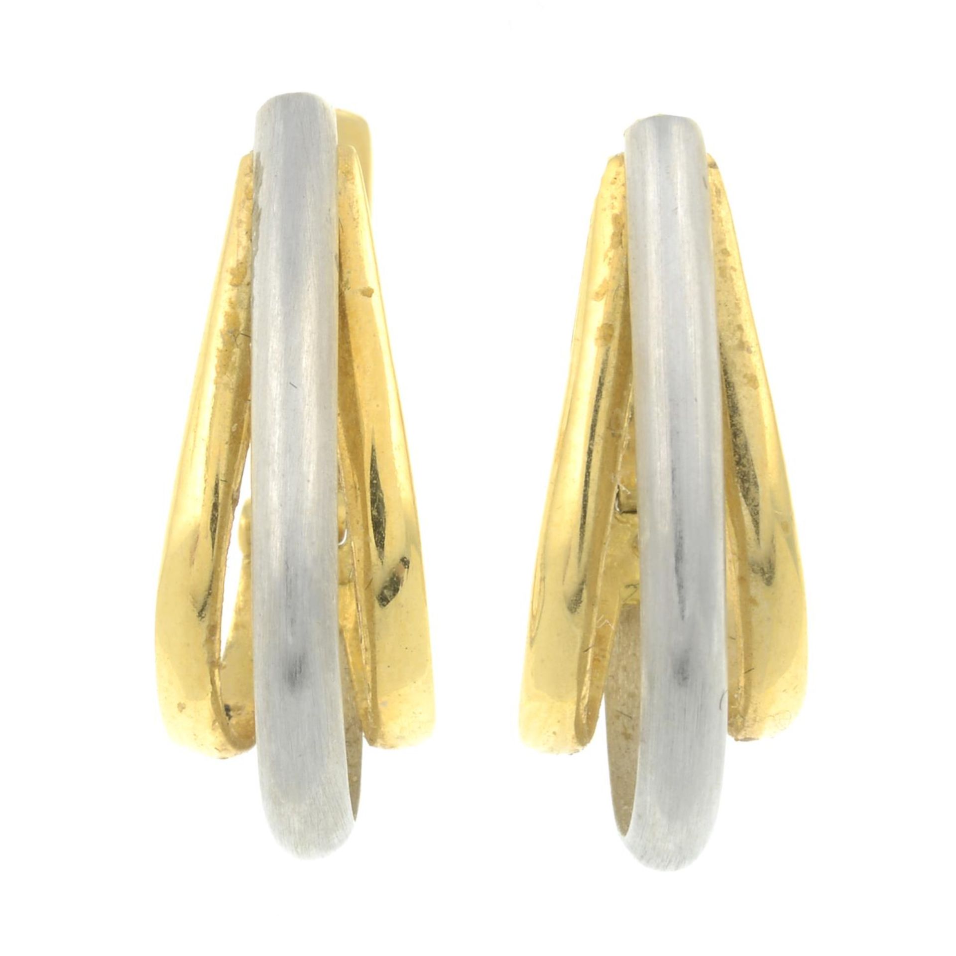 A pair of bi-colour earrings.Foreign marks.