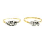 Two diamond three-stone rings.Estimated total diamond weight 0.10ct Stamped 18CT PLAT.