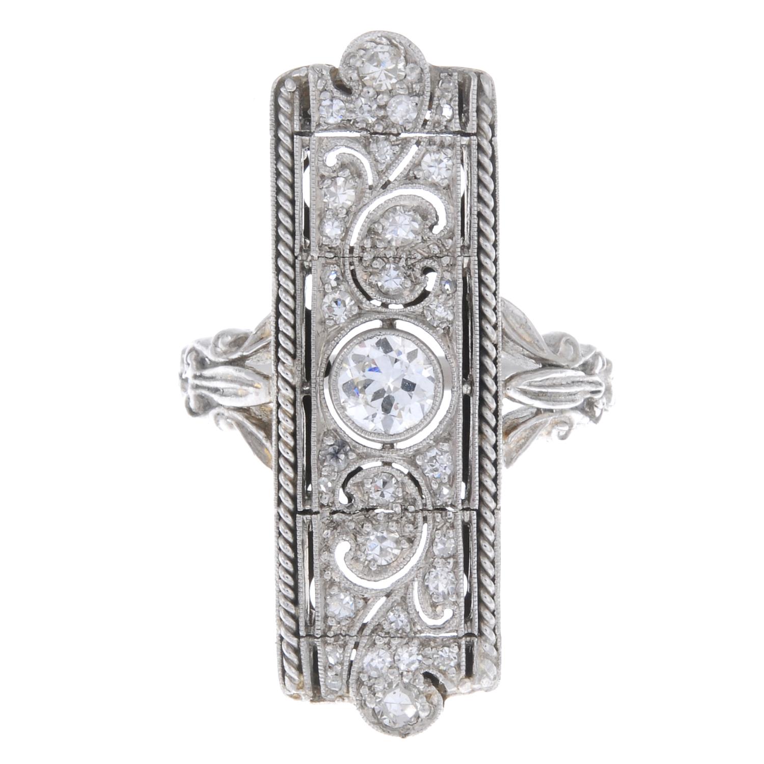An early 20th century platinum diamond dress ring.Estimated total diamond weight 0.75ct.