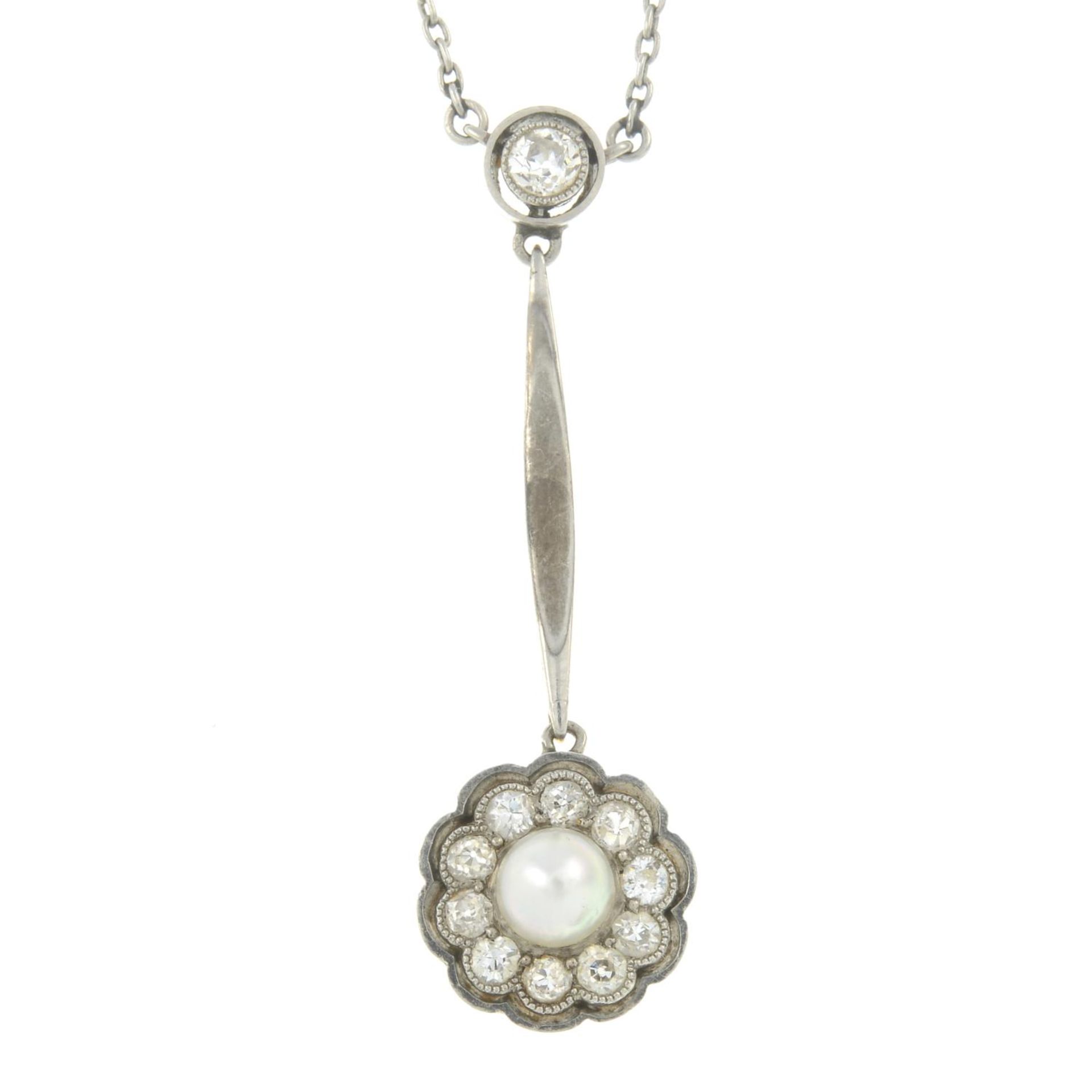 An Edwardian gold and platinum cultured pearl and diamond drop pendant,