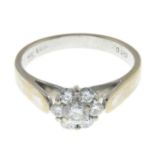 A brilliant-cut diamond cluster ring.Total diamond weight 0.50ct,