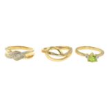 9ct gold peridot and diamond three-stone ring, hallmarks for 9ct gold, ring size J, 2gms.