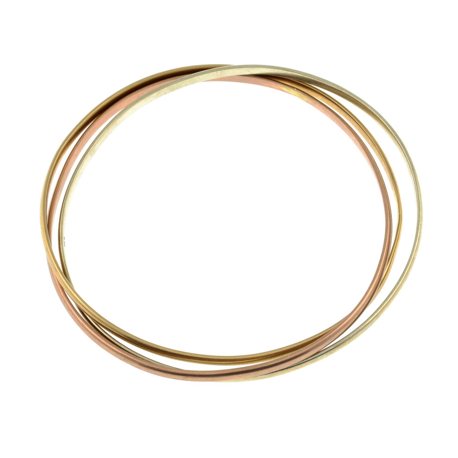 A 9ct gold tri-colour three-band bangle.Hallmarks for 9ct gold. - Bild 2 aus 2