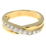 An 18ct gold brilliant-cut diamond line crossover ring.Total diamond weight 0.25ct,