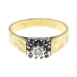 An 18ct gold sapphire and diamond cluster ring.Hallmarks for London, 1975.Ring size S1/2.